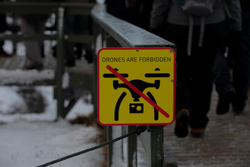 No drone zone sign. " Drones are forbidden " yellow sign