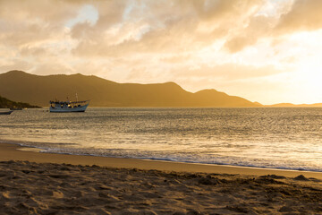 Sunset on the shore of the beach