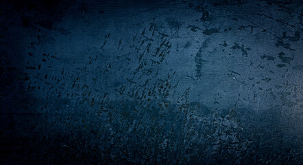 Blue dark wall, stucco, dark concrete. Dark decorative stone. Floodlight. Empty night wall, neon blue light.