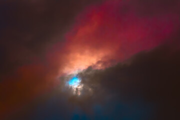 Fototapeta na wymiar Colorful sky with clouds, a bird in flight. Background design.