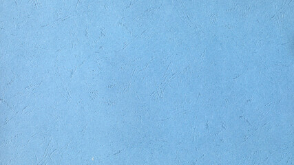 Paper or cardboard sky blue with embossing.
