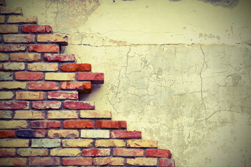 Lomo effect. The destroyed brick wall of the building.