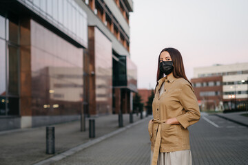 young woman in a protective mask