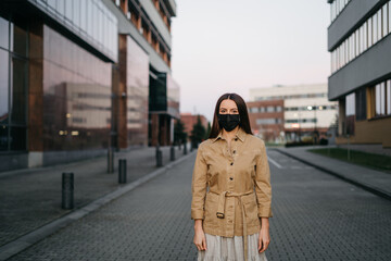 Fototapeta premium young woman in a protective mask 