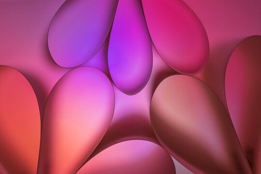 Abstract pink and purple background with glowing bubbles of different shapes and colors