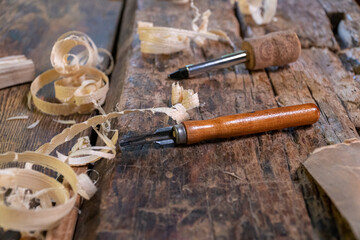 Joiner tools on an old workbench. Traces of wood processing.