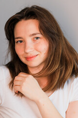 Fototapeta premium A woman wearing a white shirt.