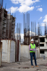 Young Engineer Working on Building Site