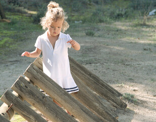 Portrait of a beautiful girl in a white dress