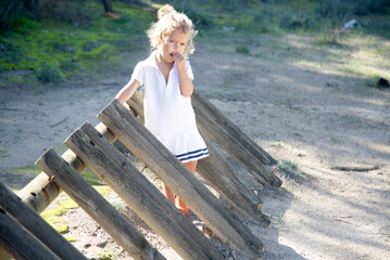 Portrait of a beautiful girl in a white dress