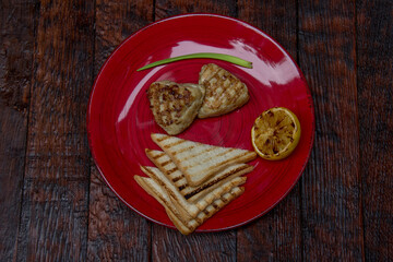meat cutlets with vegetables close-up on a decorative background. Fried meat, meat dish