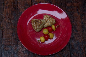 meat cutlets with vegetables close-up on a decorative background. Fried meat, meat dish