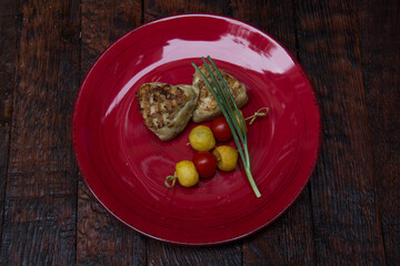 meat cutlets with vegetables close-up on a decorative background. Fried meat, meat dish