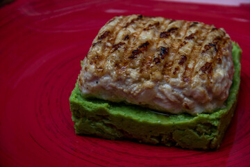 fried meat on a spinach pillow close-up. Dish of meat. Meat food