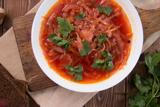 photo for menu, Ukrainian and Russian traditional beetroot soup - borscht with sour cream garlic pepper and sauce, Ukrainian borscht with sour cream, food background, Food and health