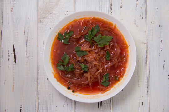 photo for menu, Ukrainian and Russian traditional beetroot soup - borscht with sour cream garlic pepper and sauce, Ukrainian borscht with sour cream, food background, Food and health