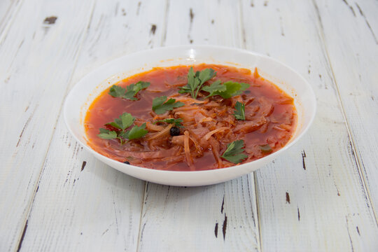 photo for menu, Ukrainian and Russian traditional beetroot soup - borscht with sour cream garlic pepper and sauce, Ukrainian borscht with sour cream, food background, Food and health