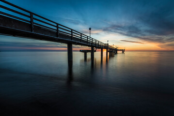 Fototapeta na wymiar pier on the baltic sea at sunset
