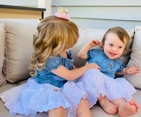 close up portrait of two Cute and Adorable sisters 