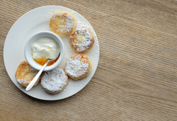 cheesecakes from cottage cheese on white plate