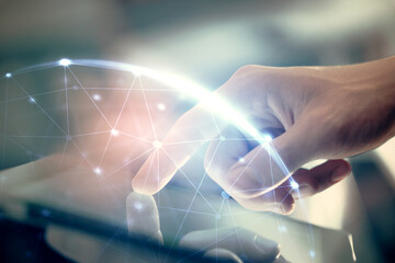 Double exposure of man's hands holding and using a phone and social network theme drawing.