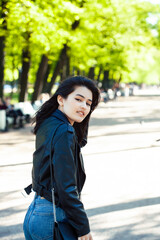 pretty young asian woman smiling cheerful in green park on summer sunny day, lifestyle people concept