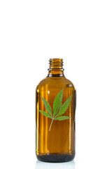 Cannabis essential oil, CBD oil extract with canabis sativa green leaf Marihuana isolated on white background. Medical marijuana , herbal medicine plant and health care concept. Space for text.