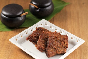 Empal or Gepuk is Indonesian Fried Meat with Traditional Herb and Spiced. It Taste Sweet, Tasty,...