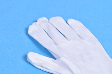 Fototapeta na wymiar 大事な物を触れる時に使用する作業用手袋