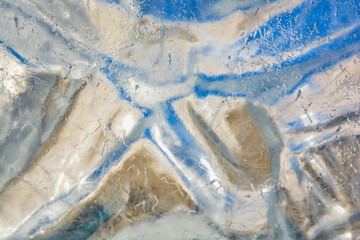 Frozen ice background with beautiful patterns