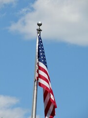 american flag and blue sky