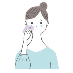 ハンカチを手に泣いている女性