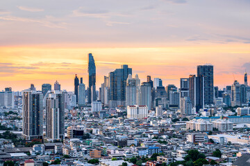 Cityscape view of Bangkok modern office with sunset sky