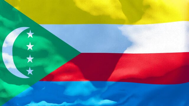 The national flag of Comoros is flying in the wind