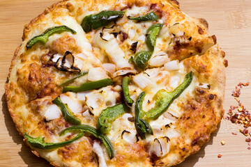 Image of Pizza placed on a desk
