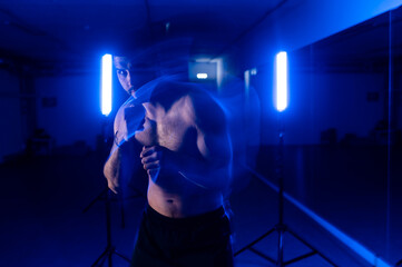boxer in motion shooting blue light
