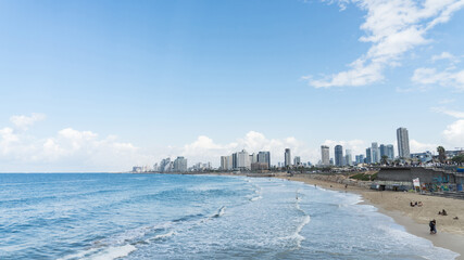 Seascape and skyscrapers on background in Tel Aviv, Israel