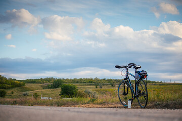 Fototapeta na wymiar bike on the road in the field