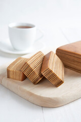 traditional indonesian kek lapis (layered cake) isolated with white background