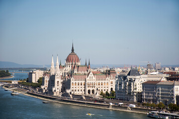 Fototapeta na wymiar View landscape and cityscape of Budapest old town city and Hungarian Parliament with tour cruises in Danube Delta river and Budapest Chain Bridge in Budapest, Hungary