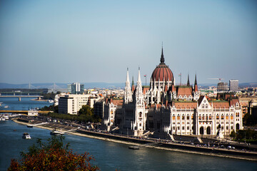 Naklejka na ściany i meble View landscape and cityscape of Budapest old town city and Hungarian Parliament with tour cruises in Danube Delta river and Budapest Chain Bridge in Budapest, Hungary