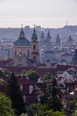 Fototapeta na wymiar Prague, Czech Republic; Church of st. Nicolaus on Mala Strana and Church of Our Lady before Týn in Background.