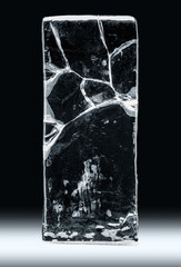 Rectangular ice block, with cracks, isolated on black background. Clipping path included.