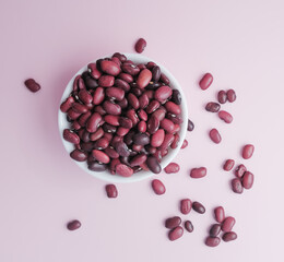 raw beans in a cup on the background