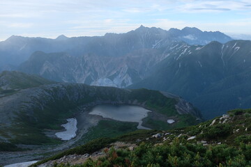 朝日に染まる槍ヶ岳。北アルプスの絶景。Fantastic sunrise time, panorama view of Japanese north alps, Yarigatake, Japan.