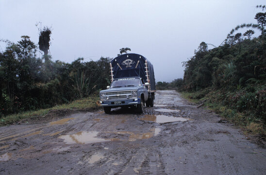 vintage chevrolet truck on a unpaved road in colombia