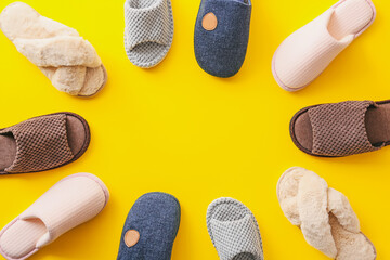 Soft slippers on color background