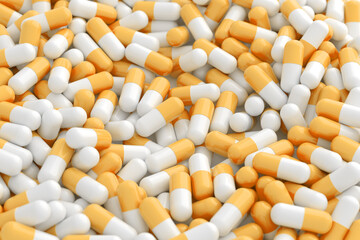 A bunch of yellow and white capsules. Multiple medicines. Many drugs. Illustration for a pharmacy or covid.