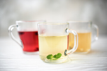 herbal tea and hibiscus tea in glass mugs