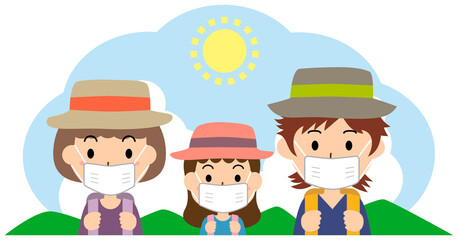 マスクをして登山をする親子